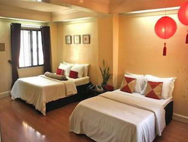 Stone House Quezon Hotel *